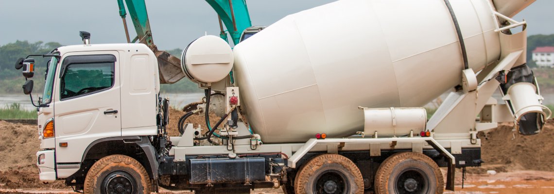 Fresh readymix concrete being poured at construction site