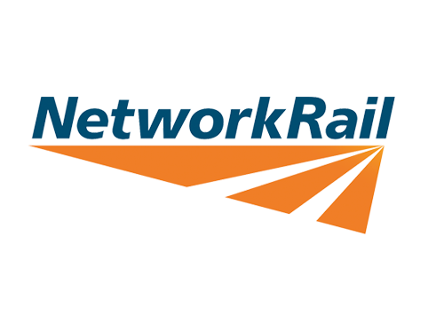 Network Rail logo with blue text and an orange rail track shape on a black background. We at Save Time Concrete, a concrete supplier, provided concrete delivery to Network Rail.
